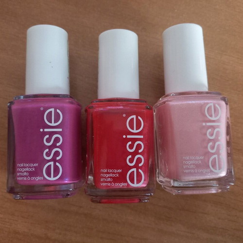 Essie nail polish in three colors like new, 2 glitters and 1 plain