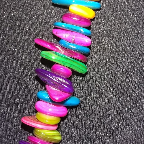 Colorful summer necklace made of brightly colored shells