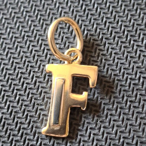 Gold monogram 14 carat like new, 3×1.5 cm, 1.97 grams