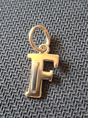 Gold monogram 14 carat like new, 3×1.5 cm, 1.97 grams