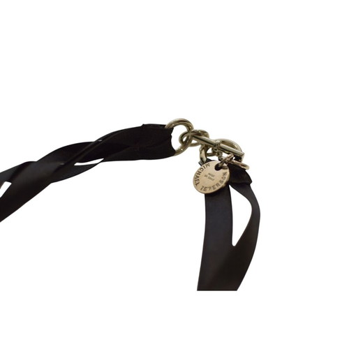 Michael Teperson necklace with black ribbon, silver tone rings and crystals used