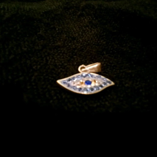 Silver evil eye pendant like new, turquoise and silver