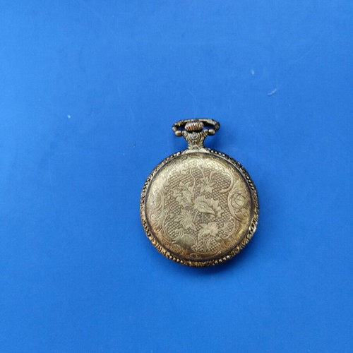 Pocket watch new in gold color with battery