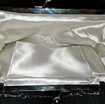 Small silver evening clutch bag used