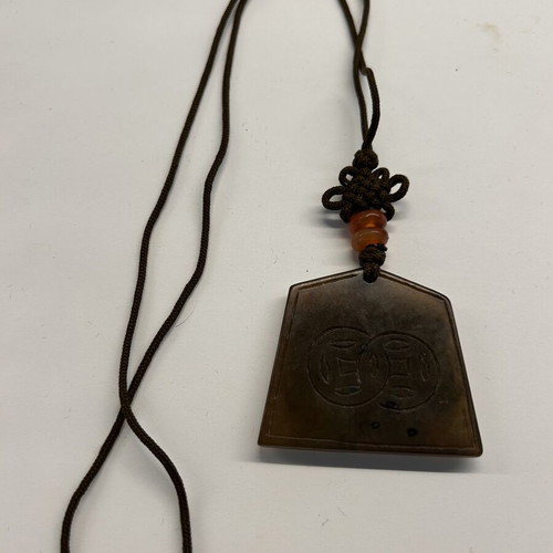 Pendant necklace with carved brown jade dragon, like new