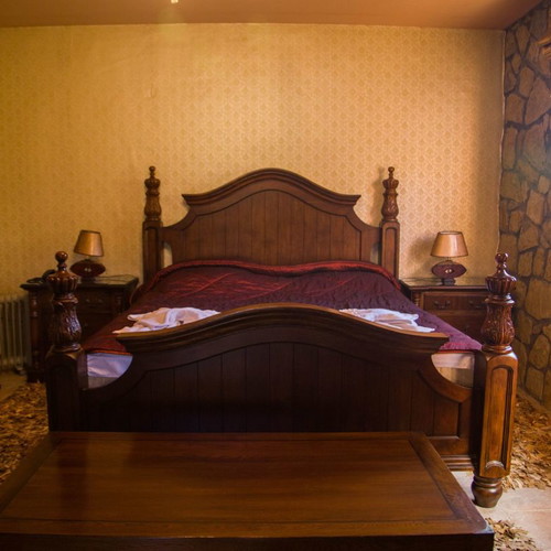 Handcrafted carved bedroom set used, Canadian origin, with 2 nightstands and vanity