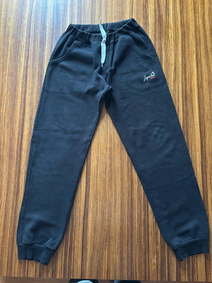 Tracksuit used with small defect, black, age 13