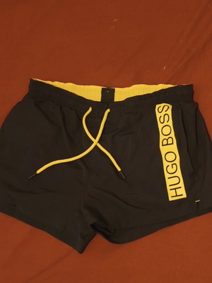 Hugo Boss men's swim shorts like new, size medium, black and multicolor