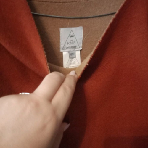The Knls coat new, tan-cinnamon color, one size, soft without buttons