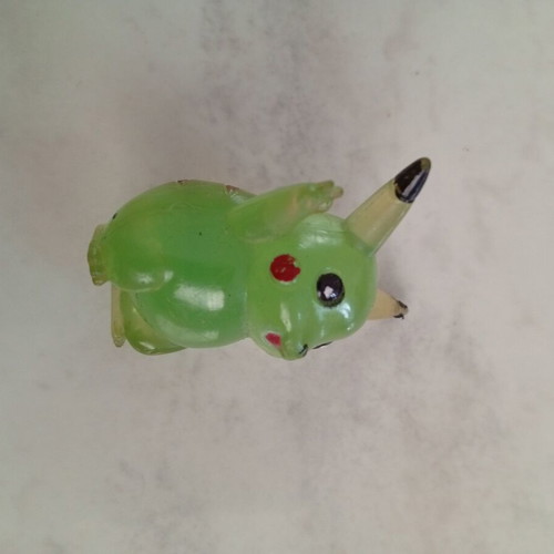 Vintage Pikachu figure miniature, clear green bootleg