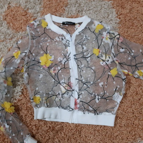 Hyper transparent cardigan with embossed flowers used