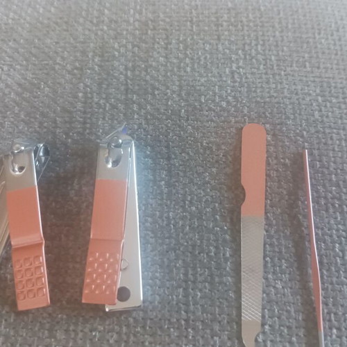 Manicure and pedicure tools stainless steel with pink case new
