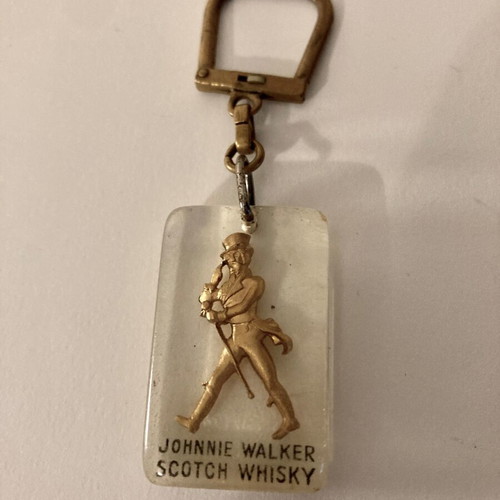 Keychains 2 collectible used Johnnie Walker and White Horse
