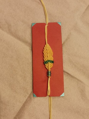 Macrame bracelet feather design new, green and yellow colors