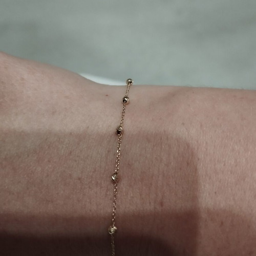9k gold bracelet with diamond-studded beads