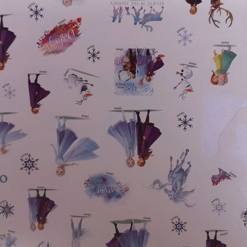 Large painting pad with watercolors and crayons used, Frozen theme