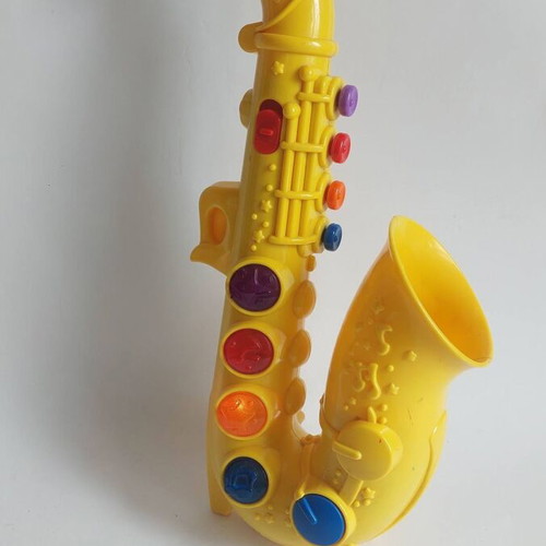 Interactive toy saxophone like new, light-up and musical