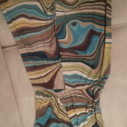One-piece colorful sleeveless jumpsuit with wrap design, like new
