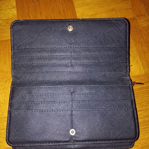 Black wallet slightly used with multiple compartments