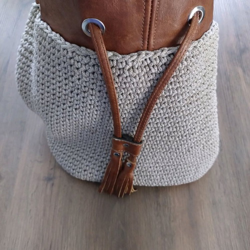 Handmade bucket bag used with brown leather details