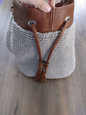 Handmade bucket bag used with brown leather details