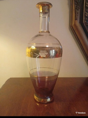 Glass antique decanter used with gold decorations 1950