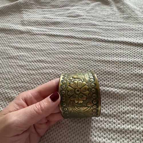 Vintage wide brass cuff bracelet with embossed floral pattern, like new