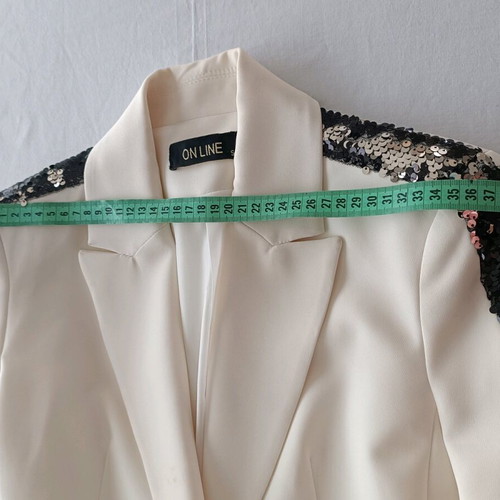 Ivory blazer On Line like new with double black-silver sequins on sleeves