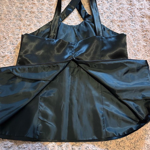 Satin top new with lace and gold details, size L