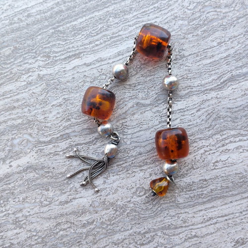 Silver Begleri with amber beads