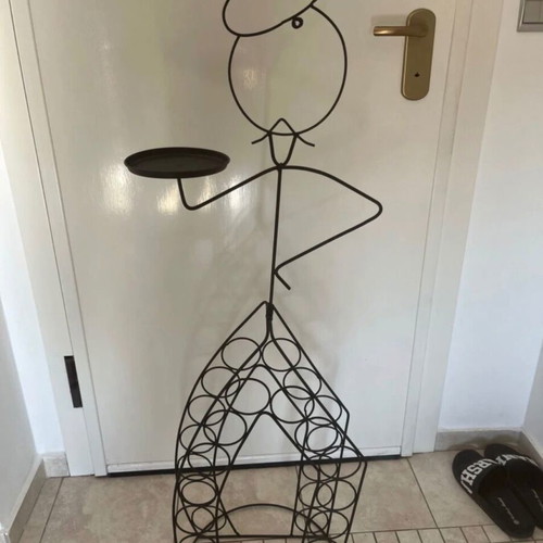 Wine rack in waiter shape