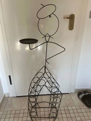Wine rack in waiter shape
