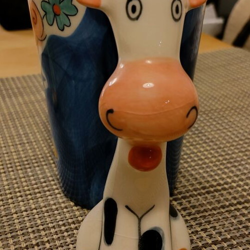 Large mugs used with cat and cow handles