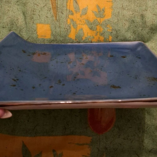 Porcelain plate blue like new with small chip on edge
