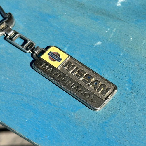 Nissan Maxima Vintage Metal Keychain used, 5.1 cm