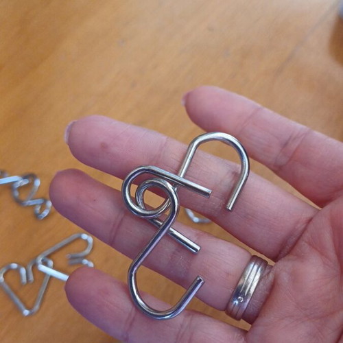 Metal wire puzzle set 10 pieces like new
