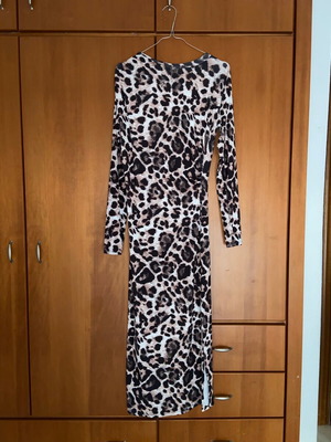 Animal print leopard dress like new with ruching and long sleeve