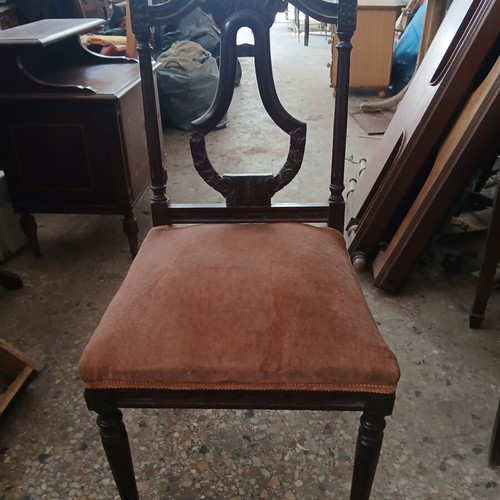 Vintage wooden chair used with brown velvet upholstery
