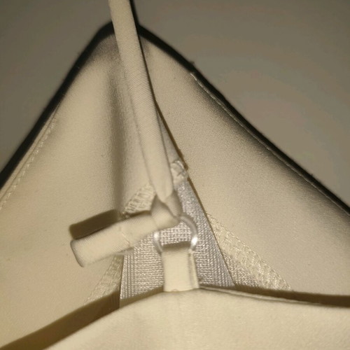 Access jumpsuit extra small white used with minor strap defect