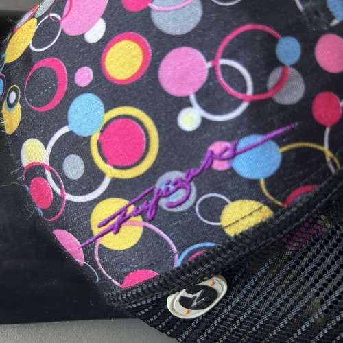Hat size S with colorful circles and visor, like new, black