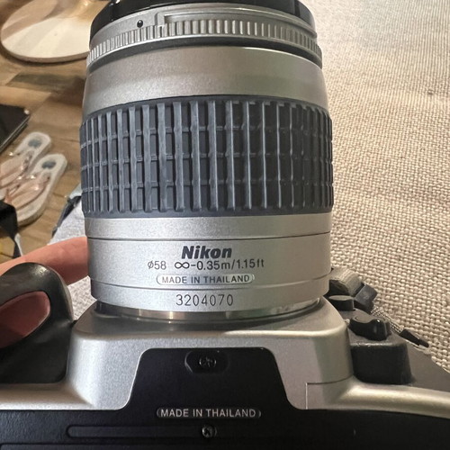 Nikon F65 SLR 35mm camera with AF Nikkor 28-80mm lens and Delsey case