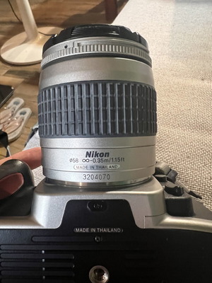 Nikon F65 SLR 35mm camera with AF Nikkor 28-80mm lens and Delsey case