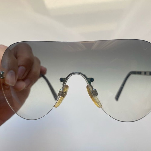 Chanel rimless sunglasses used with scratches on lenses