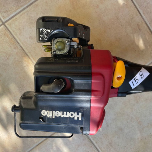 Homelite F3055 Petrol Lawn Mower used with accessories