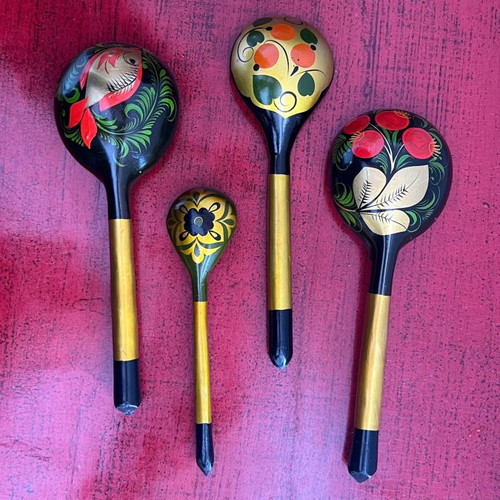 Decorative spoons used, set of 4 wooden with folk motifs