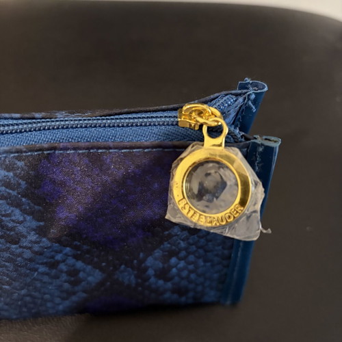 Estée Lauder blue toiletry bag like new with snake skin pattern