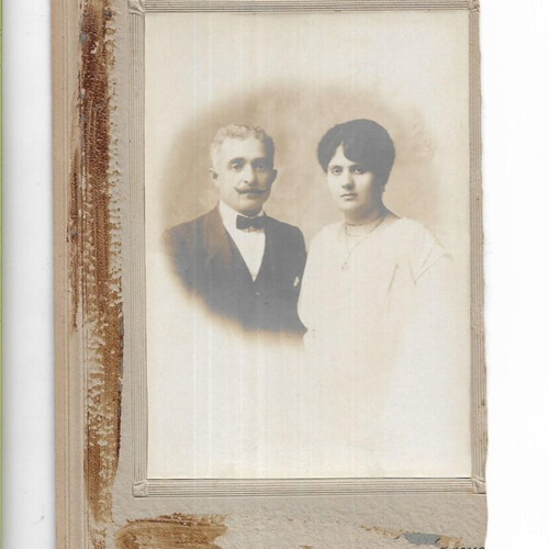 Old black and white couple portrait photo