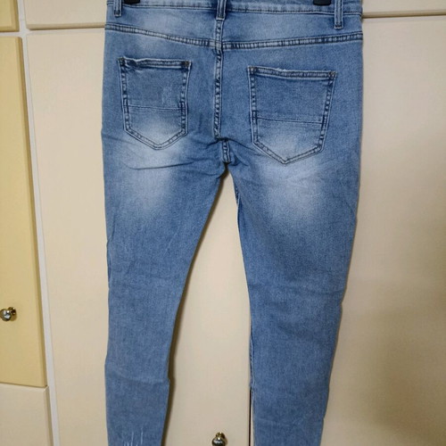 Skinny jeans men's like new with rips and zipper details