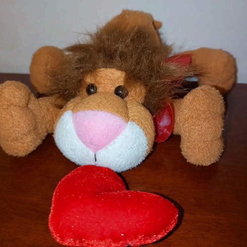 Plush lion cub used stuffed toy