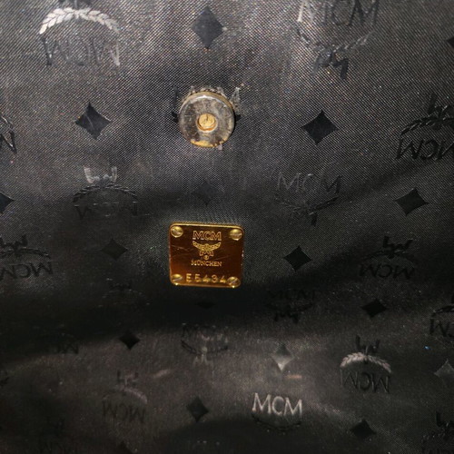 MCM shoulder bag used, black, with multiple compartments